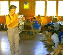 Jant at 4-H camp doing a demo on How to stay safe and be found in the wilderness                             